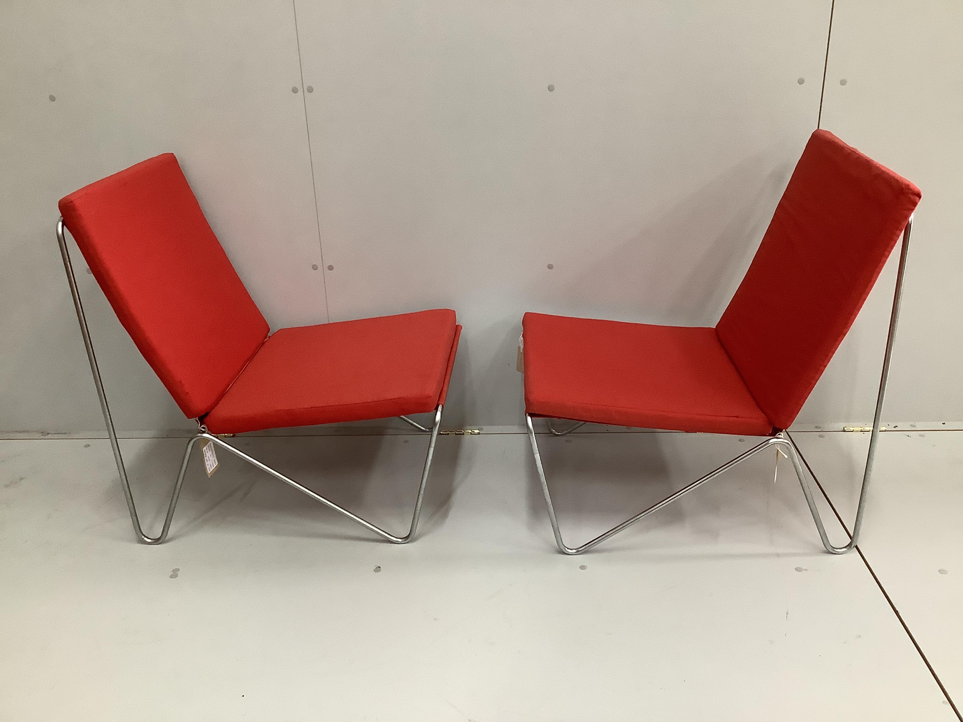 Two Danish chrome steel and red canvas Bachelor chairs (model VP-04-H201-C), each with two cushions by Verner Panton, width 50cm, depth 72cm, height 77cm - these were purchased in Frankfurt, 1965